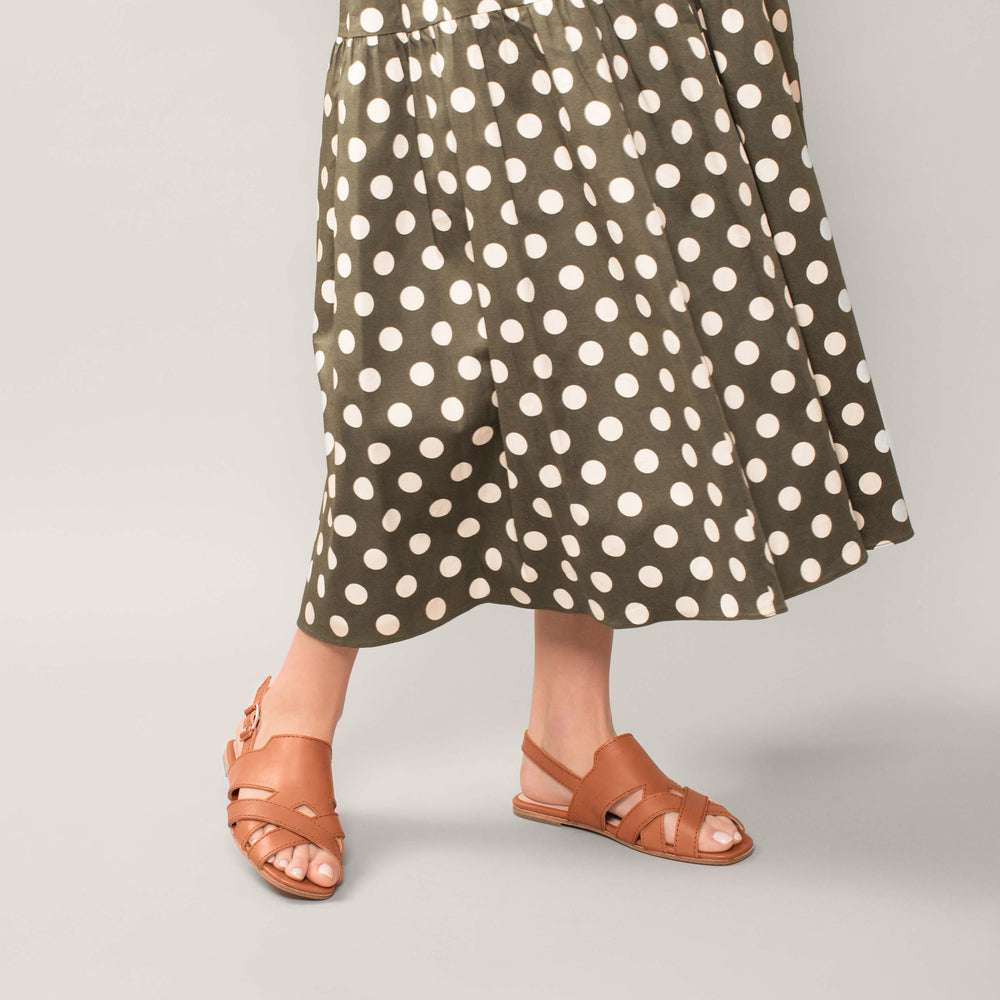 Flat sandal with ankle tie, tan and natural vachetta